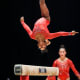 Biles competing on the balance beam at the 2015 World Gymnastics Championships.